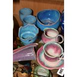 EIGHT PIECES OF STUDIO POTTERY, comprising a tea cup and saucer, matching milk jug, wall pocket,