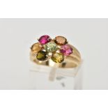A 9CT GOLD GEM SET RING, of a cluster form, set with seven oval cut, differing colour gemstones