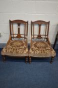 A PAIR EDWARDIAN WALNUT NURSING CHAIRS