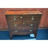 A GEORGIAN MAHOGANY AND HERRINGBONE CROSSBANDED CHEST OF TWO SHORT OVER TWO LONG DRAWERS, on high