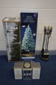 A MODERN BRASS AND METAL FIVE PIECE COMPANION SET with stand, along with two Christmas trees and a