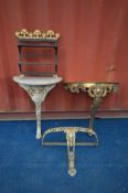 A CAST IRON DEMI LUNE CONSOLE TABLE, along with a gilt demi lune console table, a metal hanging wall