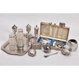 A SELECTION OF SILVER AND GLASS PEPPERETTES AND A GLASS MATCH TIDY, two sets and three single