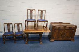 AN 1940'S OAK DRAW LEAF TABLE, on twin acorn supports, extended length 147cm x closed 89cm squared x