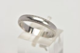 A PLATINUM WEDDING BAND, textured rim, hallmarked platinum Birmingham, ring size P, approximate