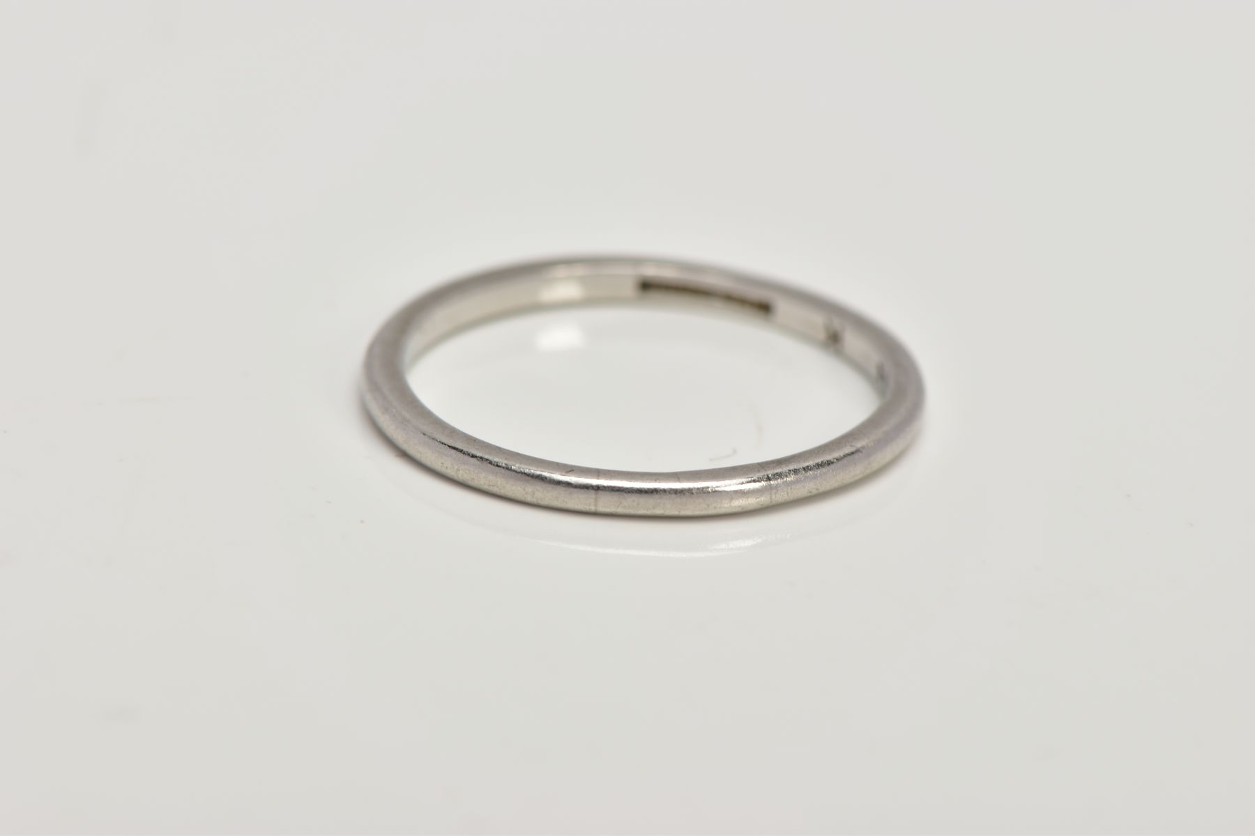 A WHITE METAL WEDDING BAND, plain polished thin band, approximate width 1.3mm, stamped ' - Image 2 of 2