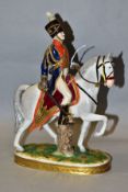 A RUDOLSTADT VOLKSTEDT PORCELAIN MILITARY FIGURE ON HORSEBACK, on an oval naturalistic plinth marked