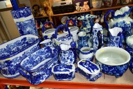 A QUANTITY OF MODERN BLUE AND WHITE CERAMICS, to include a wash bowl and jug, three watering cans,