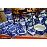 A QUANTITY OF MODERN BLUE AND WHITE CERAMICS, to include a wash bowl and jug, three watering cans,