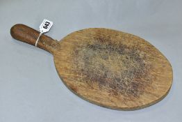 A ROBERT THOMPSON 'MOUSEMAN' CHOPPING BOARD with carved mouse on handle, approximate length 37cm (