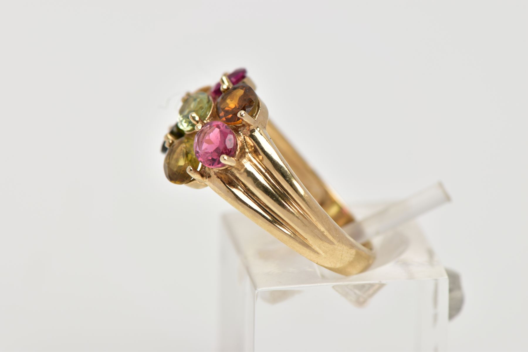 A 9CT GOLD GEM SET RING, of a cluster form, set with seven oval cut, differing colour gemstones - Image 2 of 4