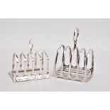 TWO SILVER TOAST RACKS, the first with rounded racks and a circular handle, engraved 'W.K.H 1928 3rd