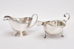 TWO SILVER SAUCE BOATS, the first with oval stepped base and gadroon pattern to the top edge,