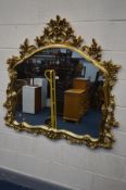 A MODERN LOUIS XV STYLE GILT ON RESIN WALL MIRROR, 121cm x 116cm