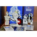 TWO BOXED MILLENNIUM COLLECTABLES AND AN UNBOXED MICHELIN FIGURE, comprising Wade Mini 'Cowboy