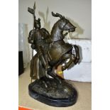 A BOXED REPRODUCTION BRONZE OF A JOUSTING KNIGHT ON HORSEBACK on a marble style plinth,