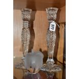 A PAIR OF WATERFORD CRYSTAL CANDLESTICKS AND A SILVESTRIA FROSTED AND CLEAR GLASS APPLE, the