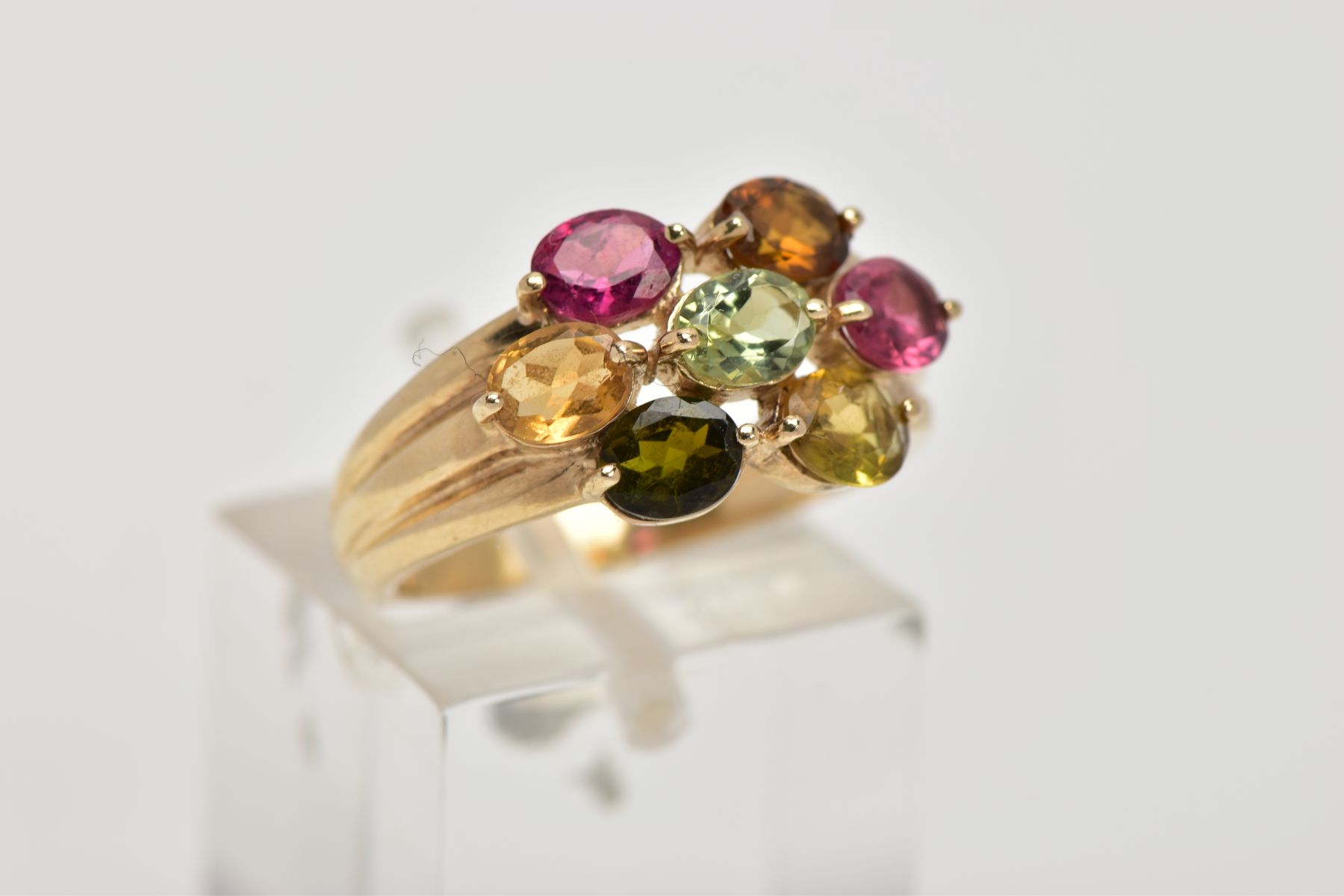 A 9CT GOLD GEM SET RING, of a cluster form, set with seven oval cut, differing colour gemstones - Image 4 of 4