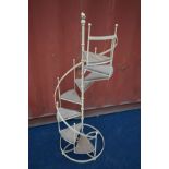 A METAL SPIRALLING STAIRCASE DISPLAY UNIT, diameter 51cm x height 134cm (the item in this lot is the