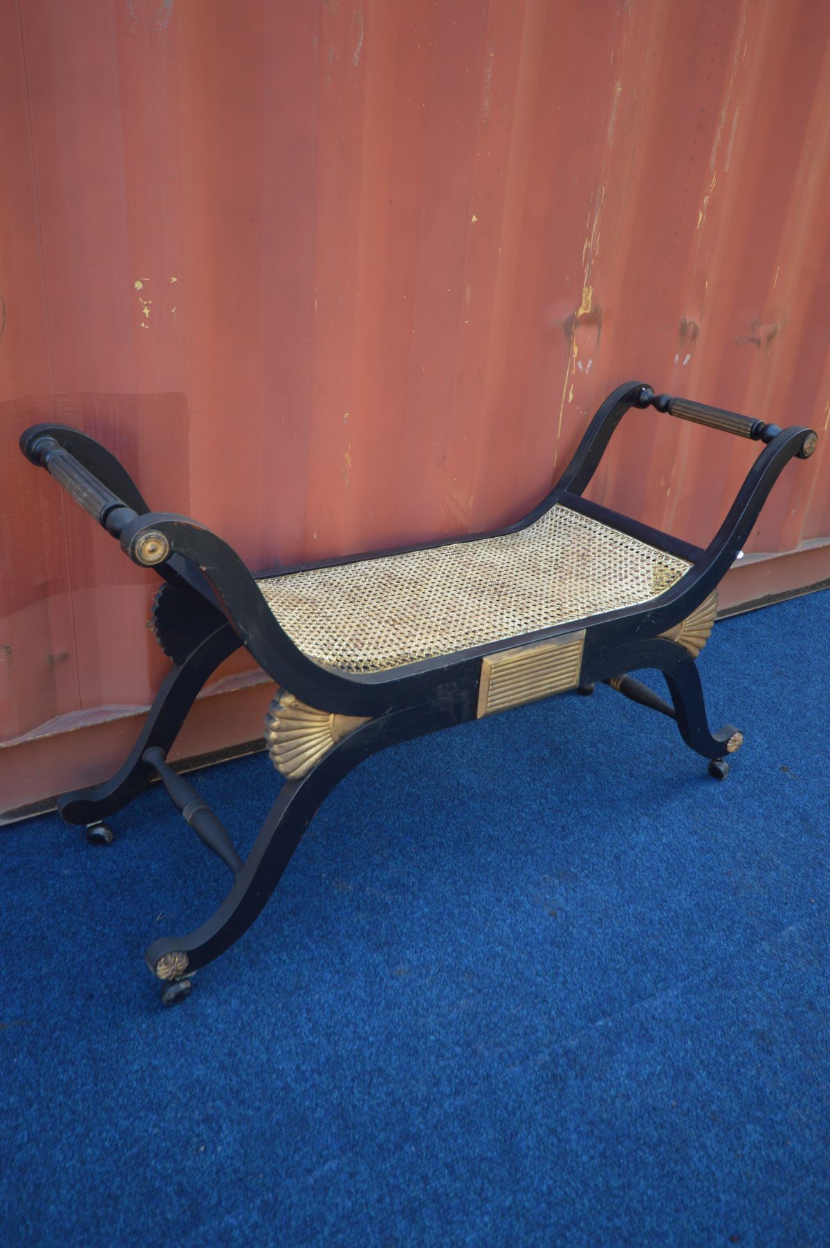 A 20TH CENTURY FRENCH EBONISED AND GILT SAVONAROLA STOOL, with a bergère seat, length 118cm x - Image 2 of 2