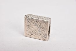 AN EARLY 20TH CENTURY 'TIFFANY & CO' STAMP HOLDER, embossed foliate design to the outside,