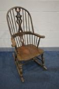 A BEECH WINDSOR ROCKING CHAIR