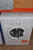 AN INDESIT IWC81482 WASHING MACHINE (PAT pass and powers up but not been checked any further)