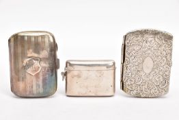 A SILVER CIGARETTE CASE, VESTA AND A SILVER PLATED CIGARETTE CASE, the cigarette case of an engine