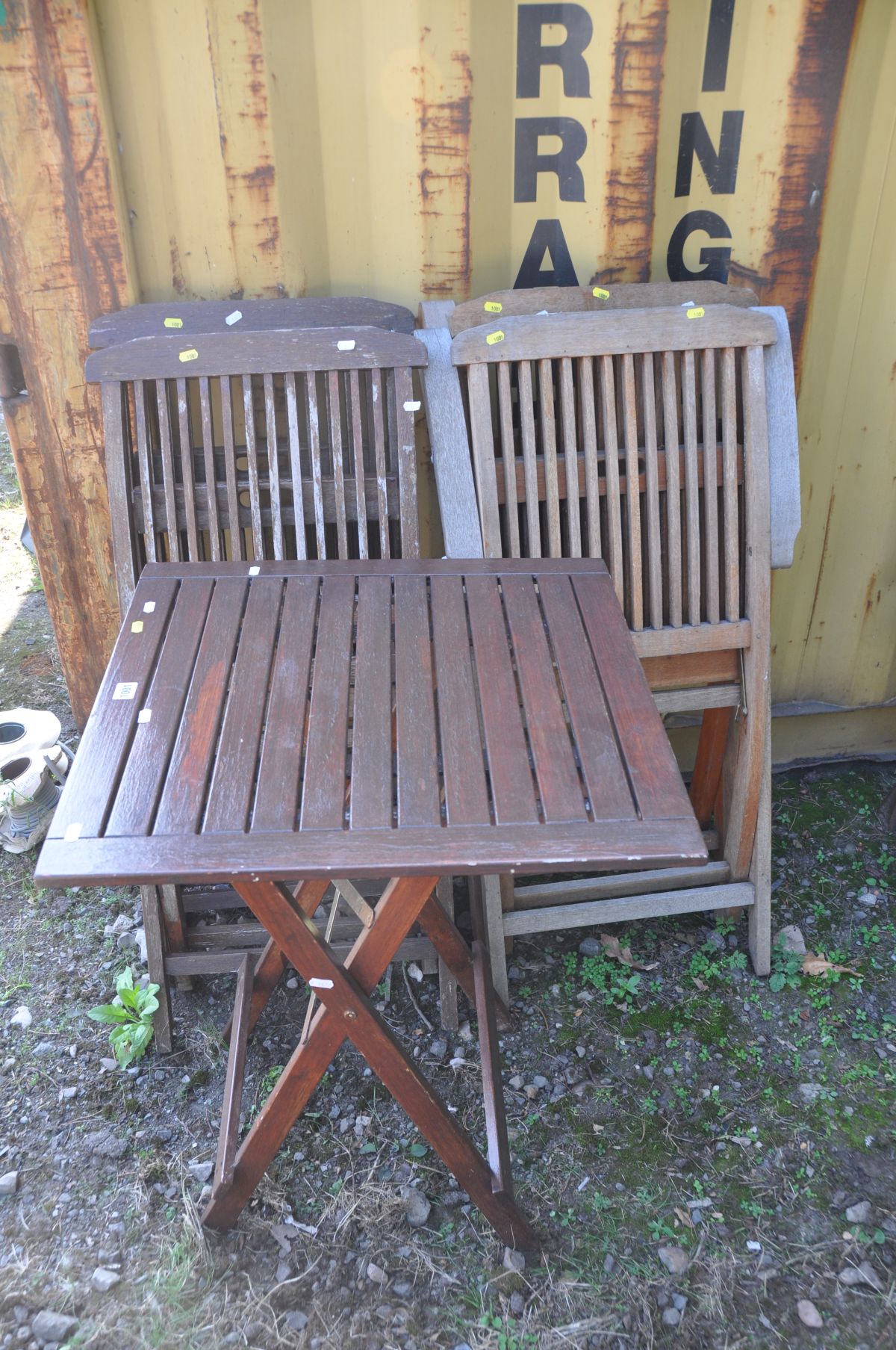 A HARDWOOD SET OF FOUR CHAIRS with a matching table 60cm squared x height 75cm (5)