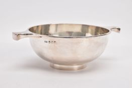 A SCOTTISH SILVER QUAICH BOWL, double handled plain polished bowl, on a slightly raised circular