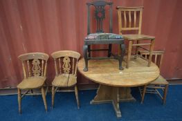 AN OAK DROP LEAF TABLE, two pairs of beech kitchen chairs (Sd) and a Georgian Chippendale style