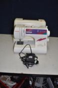 A SINGER MODEL 6408 SEWING MACHINE with pedal/power cable, and cover (PAT pass and working)