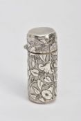 A LATE VICTORIAN SILVER CASED SMELLING SALTS BOTTLE, of a tubular form, embossed with a floral