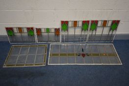 A SELECTION OF VARIOUS STAINED GLASS WINDOWS, to include a set of four windows, in two sizes, 48cm x