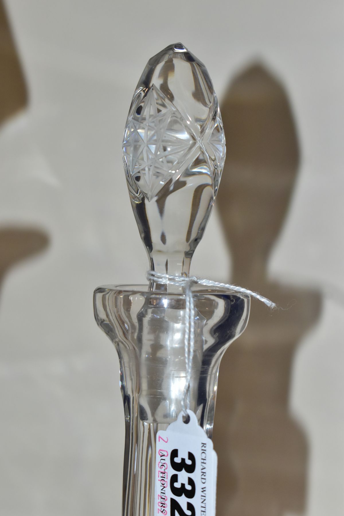 A 20TH CENTURY CLEAR CUT GLASS CLARET JUG AND A SIMILAR DECANTER, the claret jug with a facet cut - Image 2 of 5