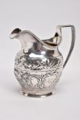 A GEORGE III SILVER CREAM JUG, with embossed scrolling acanthus leaf and floral decoration, hallmark