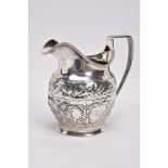 A GEORGE III SILVER CREAM JUG, with embossed scrolling acanthus leaf and floral decoration, hallmark