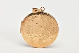 A 9CT GOLD LOCKET, of a circular form, engraved floral and foliate design to both sides, opens to