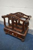 A REPRODUCTION VICTORIAN STYLE MAHOGANY CANTERBURY, with foliate scrolls, two divisions and a single