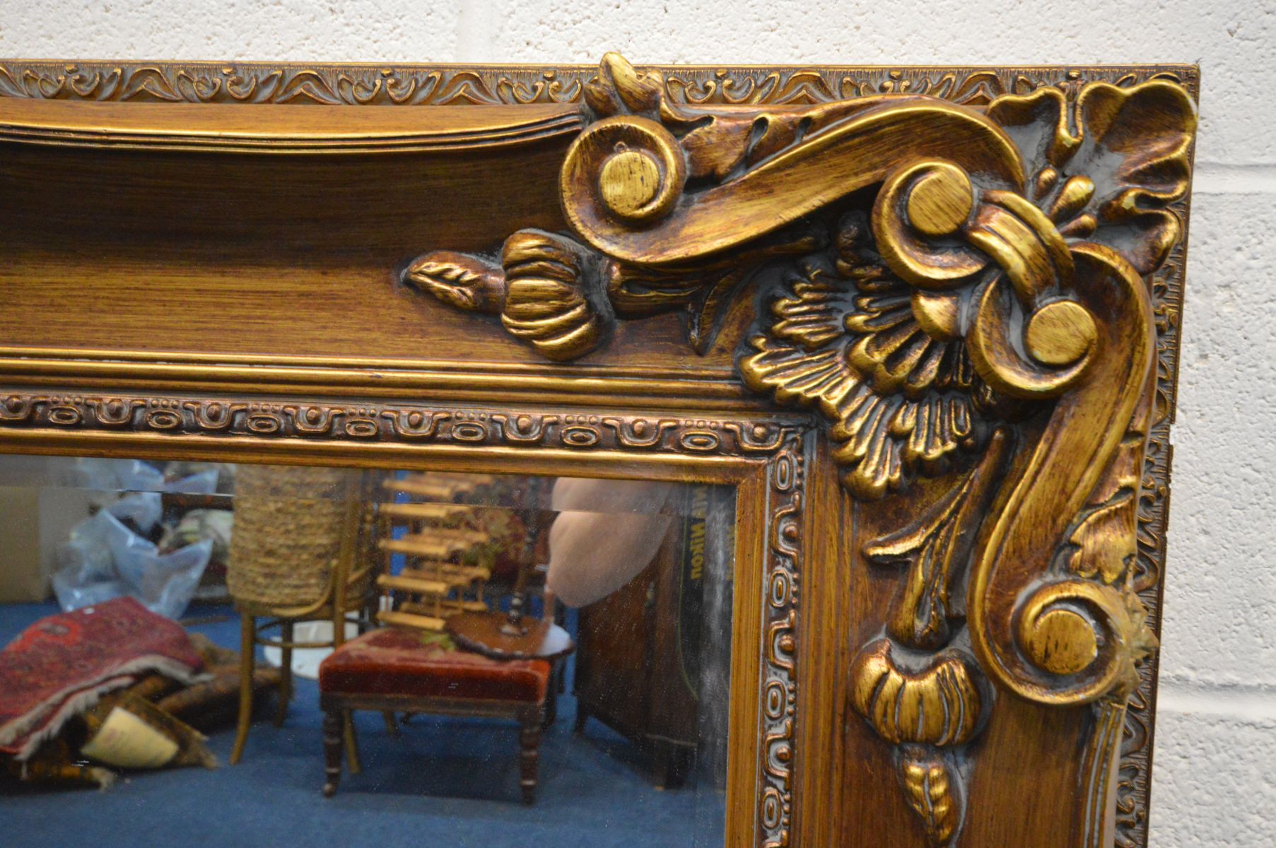 A FOLIATE GILT ON RESIN BEVELLED EDGE WALL MIRROR, 126cm x 96cm (condition - some minor chips to - Image 2 of 2