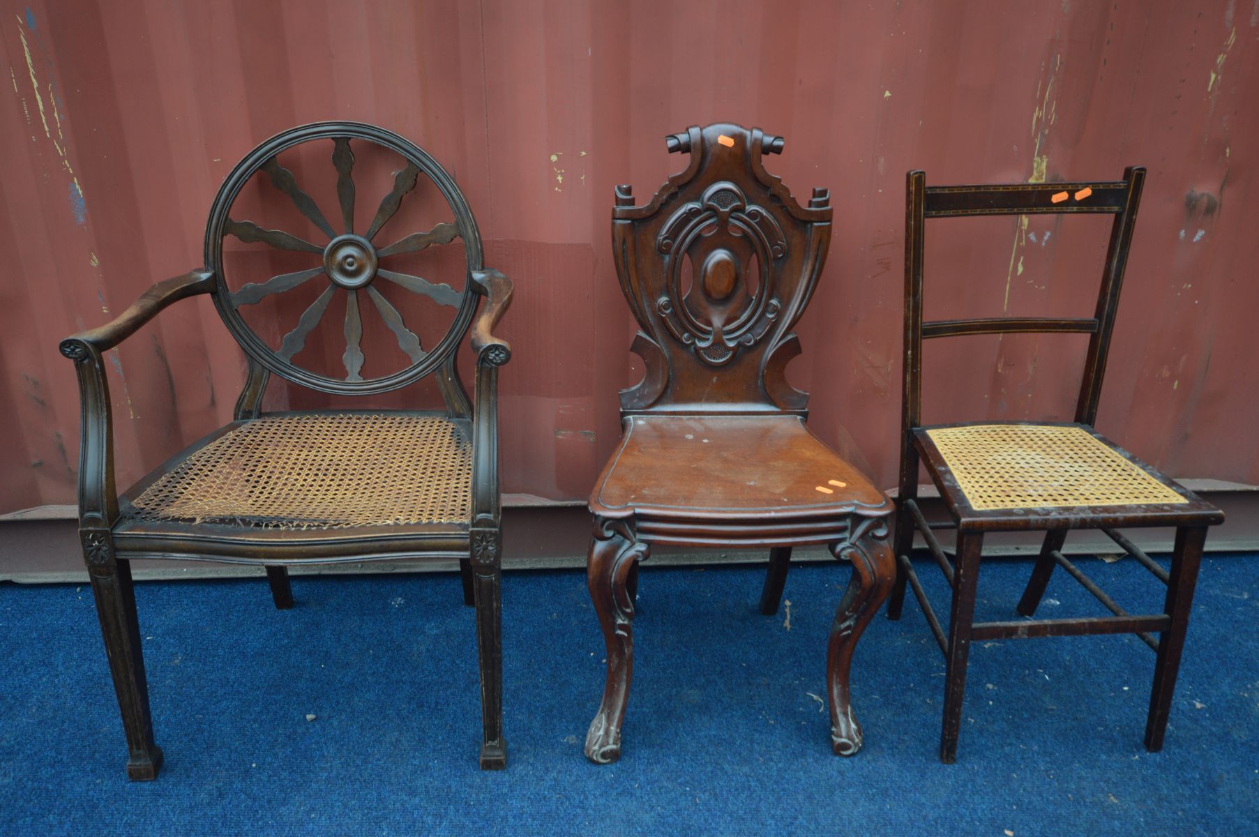 A FRENCH STYLE OPEN ARMCHAIR with a circular wheel back and bergère seat (Sd) a Victorian mahogany