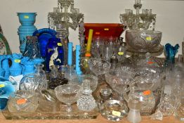 APPROXIMATELY EIGHTY PIECES OF GLASSWARES to include a pair of candelabra (some parts missing),