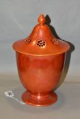 RUSKIN POTTERY, a large orange lustre pot pourri jar with cover, the jar has a ringed foot,