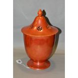 RUSKIN POTTERY, a large orange lustre pot pourri jar with cover, the jar has a ringed foot,