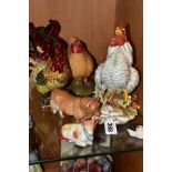 SIX VARIOUS CERAMICS AND METAL MODELS OF POULTRY AND FARM ANIMALS, comprising a Capodimonte white