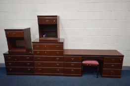 A SEVEN PIECE MAHOGANY BEDROOM SUITE, comprising a mirrored six door wardrobe, that breaks in