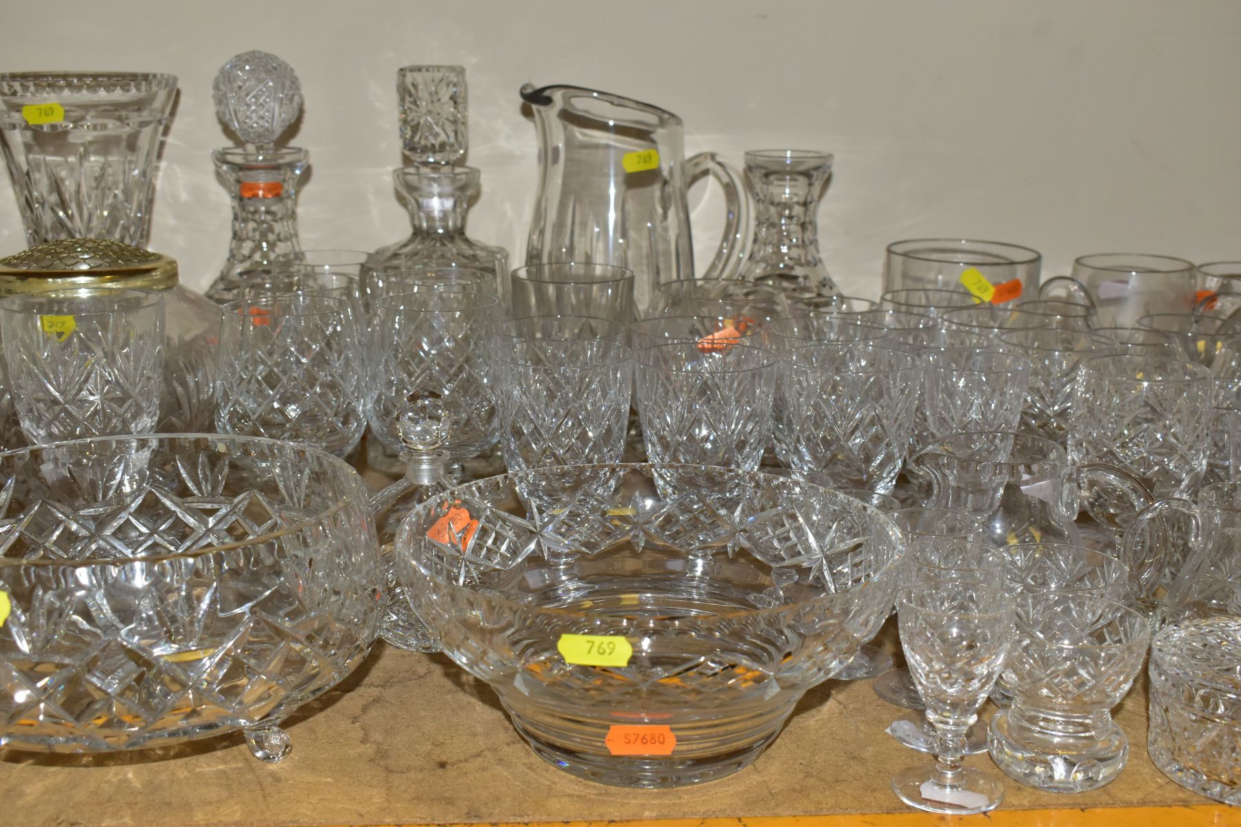 APPROXIMATELY SEVENTY FIVE PIECES OF CUT GLASS AND CRYSTAL, to include three decanters (one