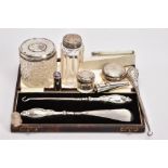 A SELECTION OF SILVERWARE, to include a cased shoe horn and boot pull set, both with embossed silver