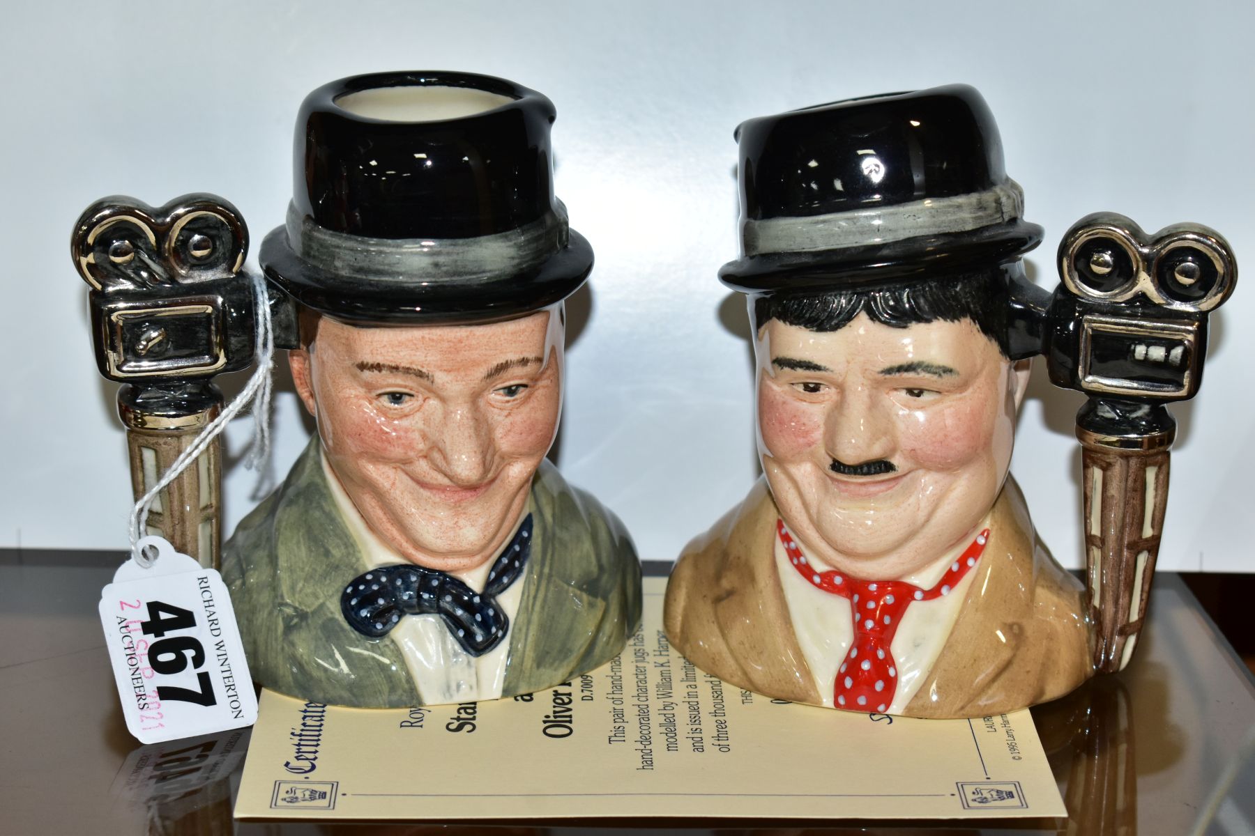 A PAIR OF ROYAL DOULTON LIMITED EDITION CHARACTER JUGS, from Laurel and Hardy, Stan Laurel D7008 and