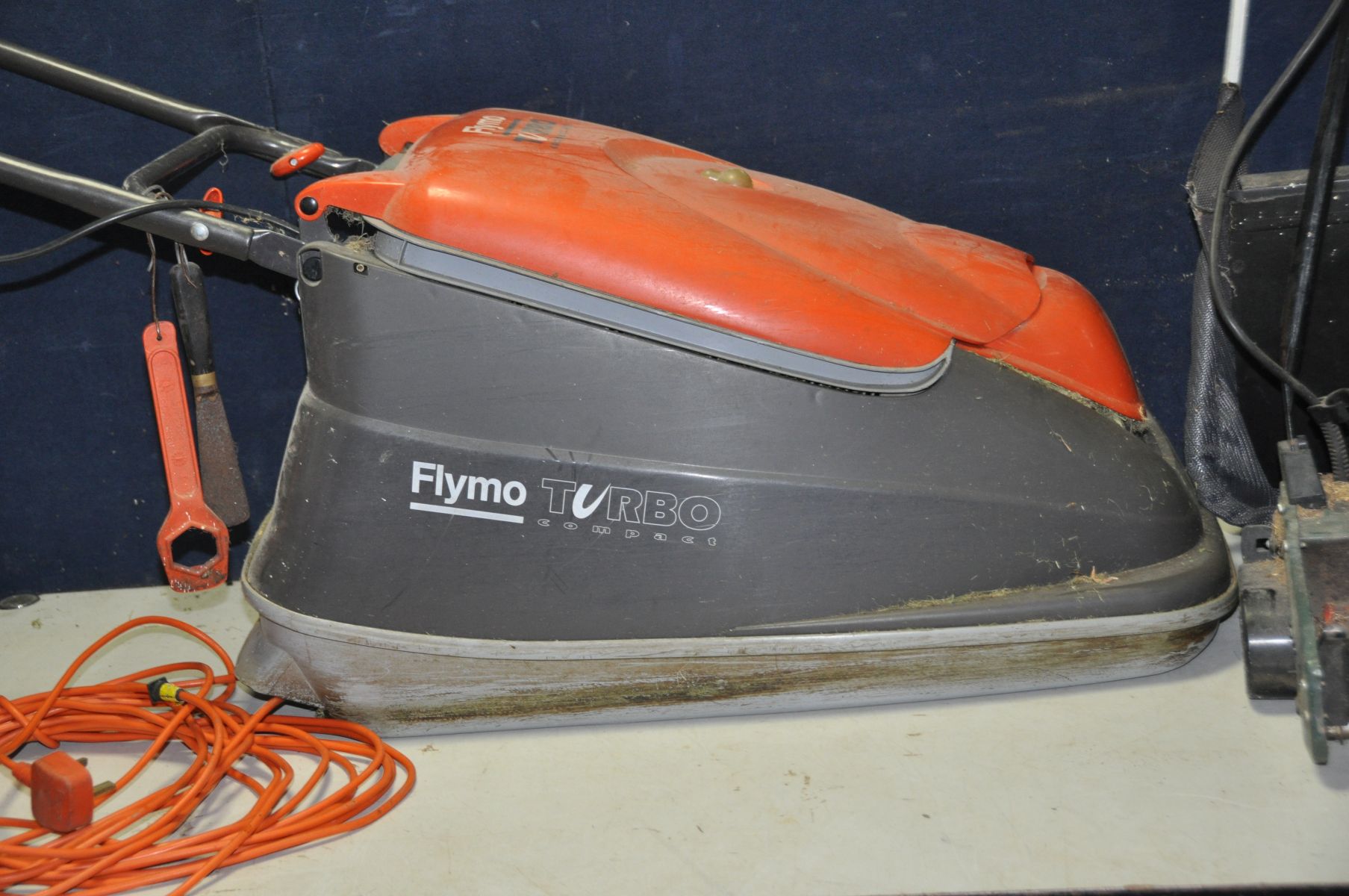 A FLYMO TURBO COMPACT 380 LAWN MOWER (PAT pass and working) and a Black and Decker Lawn Raker ( - Image 2 of 3